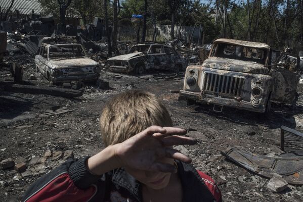 قرية لوزوفوي جراء قصف القوات الأوكرانية في محافظة دونيتسك - سبوتنيك عربي