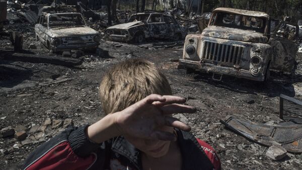 قرية لوزوفوي جراء قصف القوات الأوكرانية في محافظة دونيتسك - سبوتنيك عربي