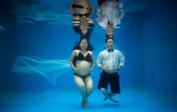 مراسم الزواج تحت الماء، الصين. - سبوتنيك عربي