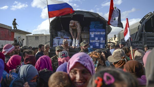 توزيع مواد إغاثية روسية في سوريا - سبوتنيك عربي