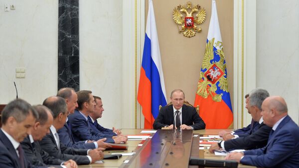 الرئيس بوتين خلال اجتماع مع أعضاء مجلس الأمن القومي - سبوتنيك عربي