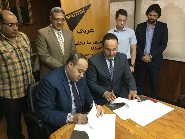 توقيع الإتفاقية بين سبوتنيك والأخبار توقيع الإتفاقية بين سبوتنيك والأخبار - سبوتنيك عربي