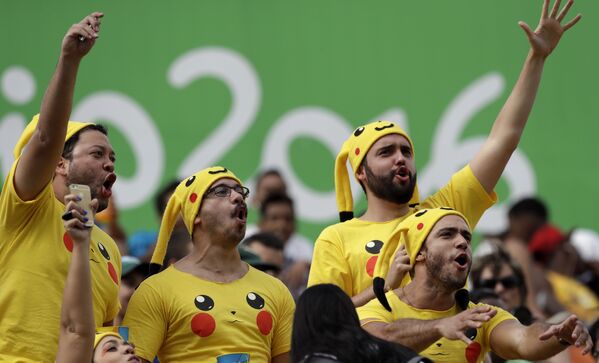 أولمبياد ريو 2016 - مشجعون يغنون خلال لمباراة لكرة رغبي للرجال، 11 أغسطس/ آب 2016 - سبوتنيك عربي