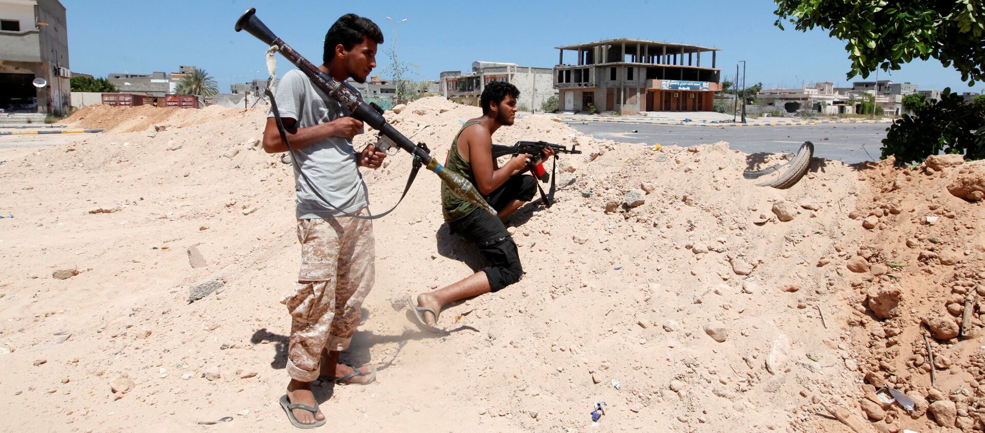 ليبيا - أفراد القوات الليبية خلال تواجدهم في مواقع المواجهة ضد تنظيم داعش في مدينة سرت، 15 أغسطس/ آب 2016 - سبوتنيك عربي, 1920, 28.02.2021