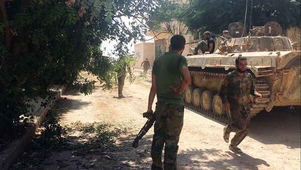 جنود من الجيش السورى خلال تقدم القوات السورية في جنوب غرب حلب - سبوتنيك عربي