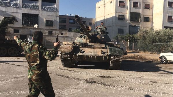 قوات الجيش السوري خلال تقدمها في أحياء جنوب غرب مدينة حلب. - سبوتنيك عربي