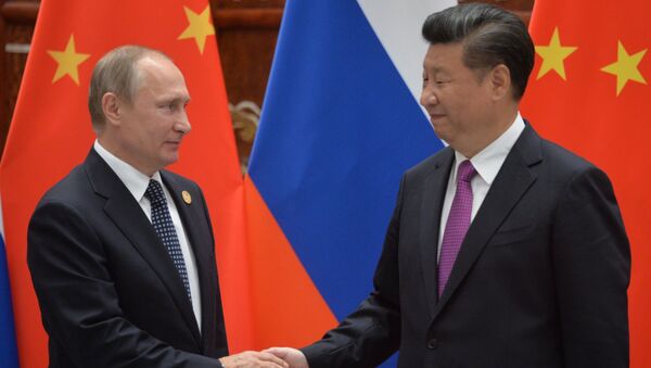 بوتين مع الرئيس الصيني - سبوتنيك عربي