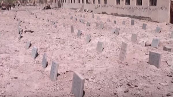 مقبرة جماعية لداعش - سبوتنيك عربي