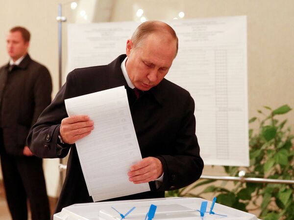 بوتين يشارك فى الانتخابات البرلمانية الروسية - سبوتنيك عربي