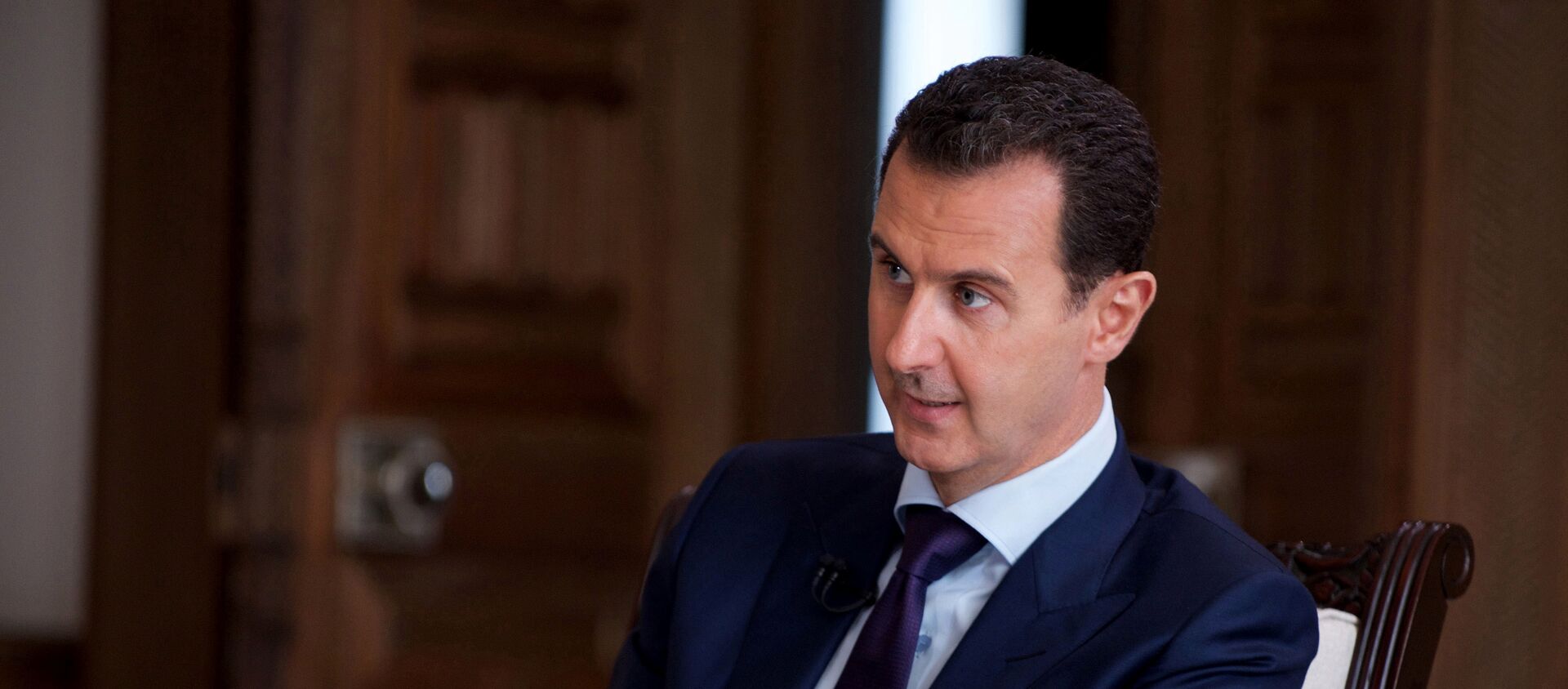الرئيس السوري بشار الأسد خلال مقابلة مع قناة تلفزيونية أسترالية SBS في دمشق، سوريا 1 يوليو/ تموز 2016 - سبوتنيك عربي, 1920, 28.05.2021