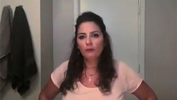 لبنانية تحلق شعرها - سبوتنيك عربي
