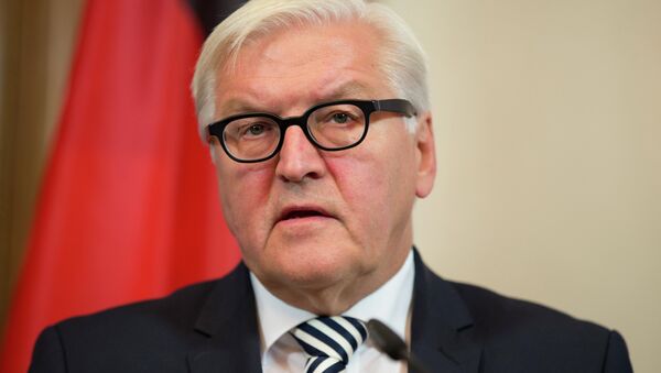 German Foreign Minister Frank-Walter Steinmeier speaks about the ongoing crisis in Syria during a news conference with U.S. Secretary of State John Kerry at Villa Borsig, Berlin, Sunday, Sept. 20, 2015 - سبوتنيك عربي