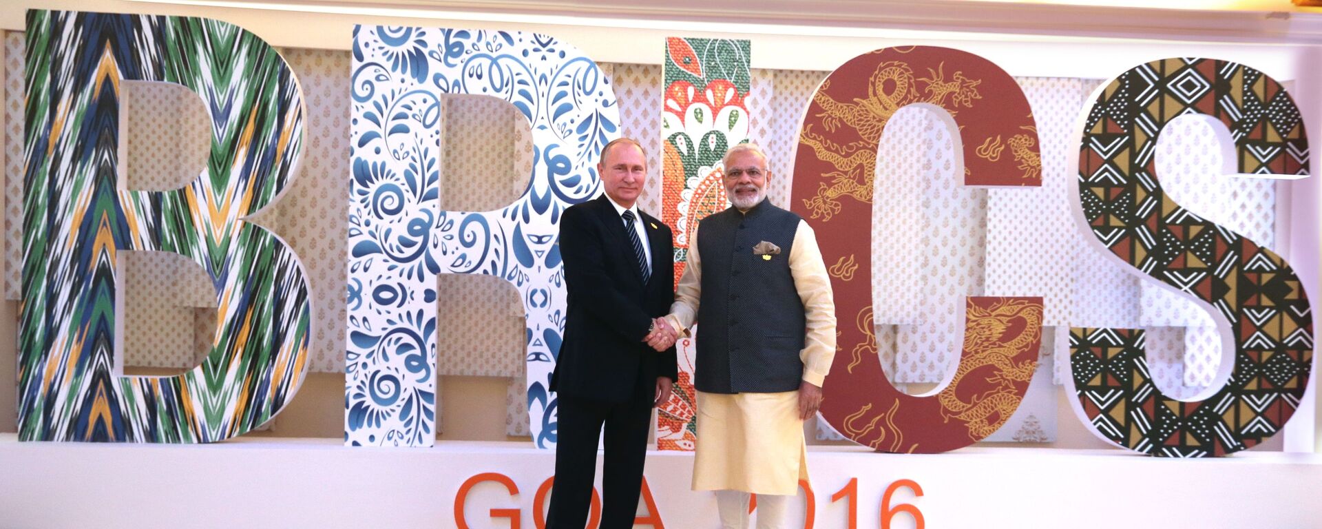 الرئيس الروسي فلاديمير بوتين والرئيس الهندي ناريندرا مودي خلال قمة بريكس في الهند - سبوتنيك عربي, 1920, 28.04.2023