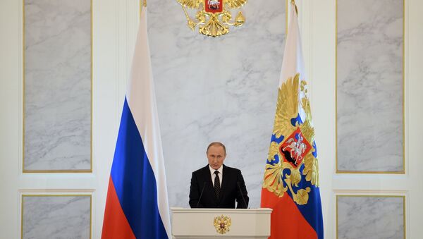 الرئيس فلاديمير بوتين خلال إعلان رسالته السنوية أمام البرلمان الاتحادي الروسي في الكرملين، 3 ديسمبر/ كانون الأول 2016 - سبوتنيك عربي