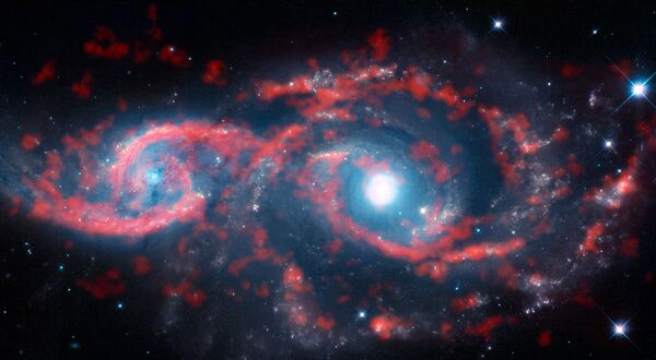 تقارب المجرات IC 2163 و NGC 2207 في كوكبة الكلب - سبوتنيك عربي