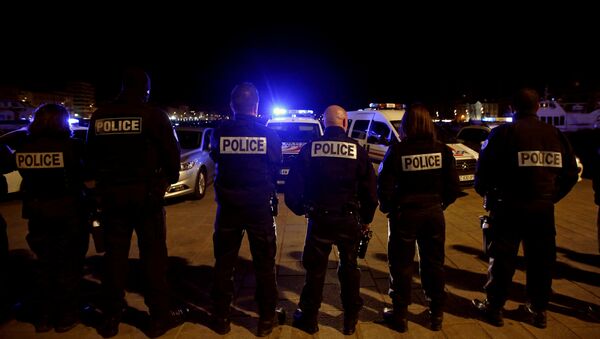 Police officers gather during an unauthorised protest against anti-police violence at the old harbour in Marseille, France, early October 19, 2016 - سبوتنيك عربي