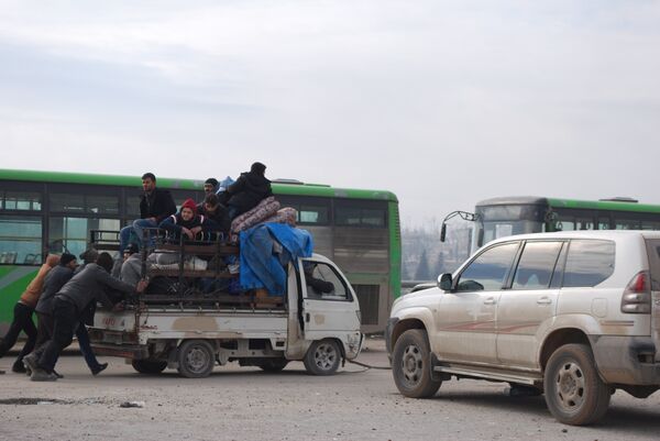 تعليق عملية إجلاء المسلحين من الأحياء الشرقية لحلب تعليق عملية إجلاء المسلحين من الأحياء الشرقية لحلب - سبوتنيك عربي