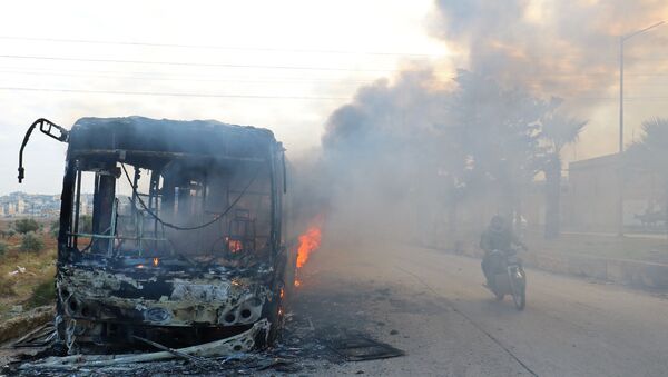 المسلحون يحرقون حافلات نقل المدنيين في ريف إدلب - سبوتنيك عربي