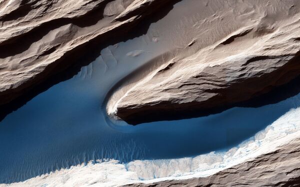سطح كوكب المريخ الذي تكون نتيجة للرياح - سبوتنيك عربي