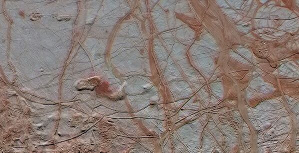 السطح الجليدي من القمر يوروبا التابع لكوكب المشتري، وكالة ناسا الفضائية - سبوتنيك عربي