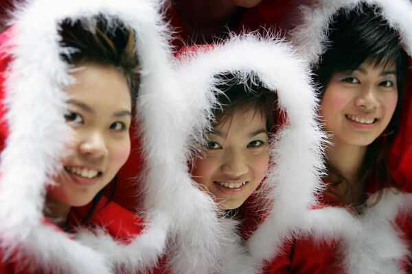 فتيات بابا نويل في هونغ كونغ، 7 ديسمبر/ كانون الأول 2005 - سبوتنيك عربي