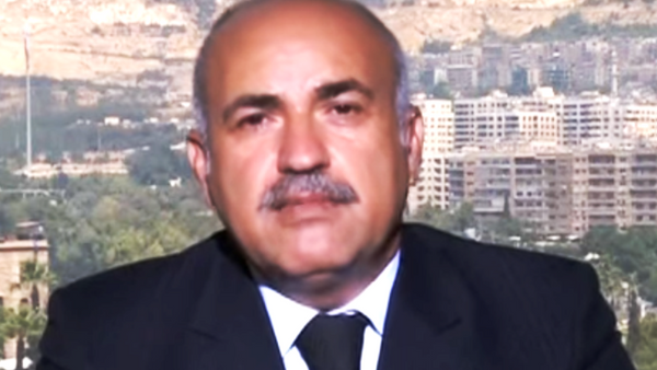المستشار السياسي لوزير الإعلام السوري الدكتور علي الأحمد - سبوتنيك عربي