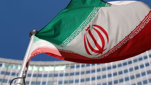 Иранский флаг развевается перед зданием ООН в Вене - سبوتنيك عربي