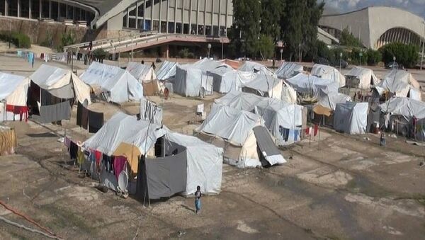 مخيم للنازحين السوريين في اللاذقية - سبوتنيك عربي