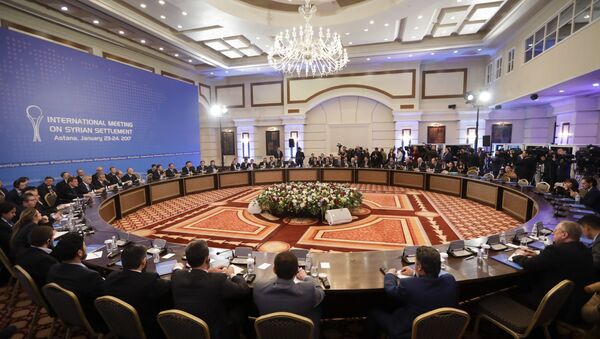 Delegations of Russia, Iran and Turkey hold talks on Syrian peace at a hotel in Astana, Kazakhstan, Monday, Jan. 23, 2017. - سبوتنيك عربي