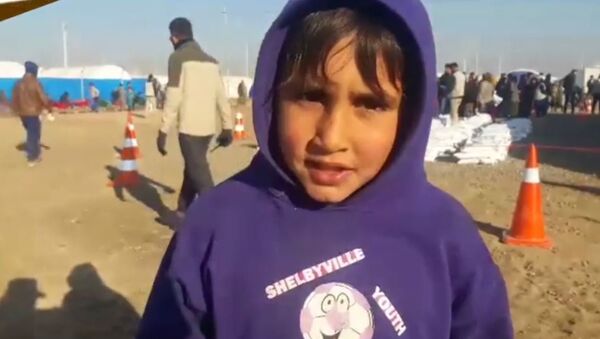 طفل عراقي هرب من داعش - سبوتنيك عربي