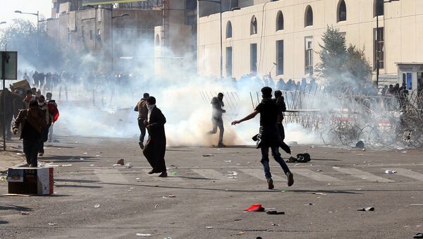 أعمال عنف خلال مظاهرات بغداد اليوم - سبوتنيك عربي