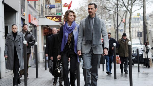 الرئيس السوري بشار الأسد برفقة زوجته أسماء الأسد - سبوتنيك عربي