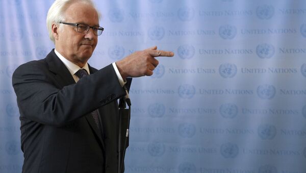 ممثل روسيا الدائم لدى الأمم المتحدة فيتالي تشوركين يتحدث إلى الصحفيين بعد اجتماع غير رسمي لمجلس الأمن حول مناقشة الوضع في سوريا، نيويورك، 26 يوليو/ تموز 2013 - سبوتنيك عربي