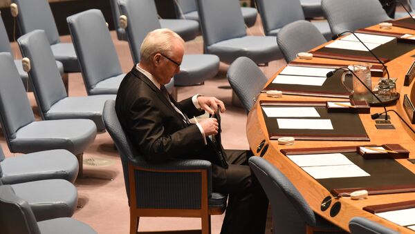 ممثل روسيا الدائم لدى الأمم المتحدة فيتالي تشوركين بمجلس الأمن في نيويورك، 13 ابريل/ نيسان 2014 - سبوتنيك عربي