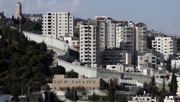 الجدار الفاصل بين الضفة الغربية (حيث الأراضي الفلسطينية) وإسرائيل - سبوتنيك عربي