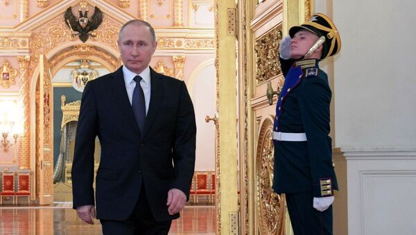 الرئيس فلاديمير بوتين خلال مراسم تعيين الضباط الروس لمناصب علية - سبوتنيك عربي