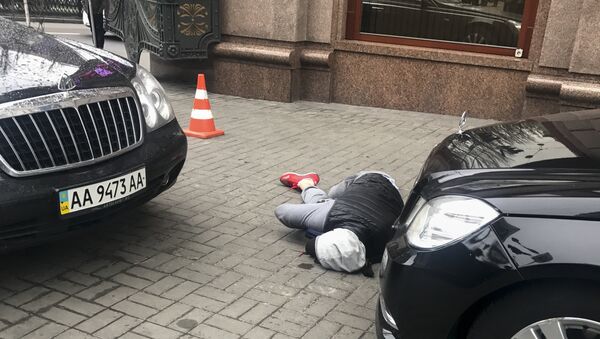An assassin, who shot and killed Denis Voronenkov, lies wounded in Kiev, Ukraine - سبوتنيك عربي