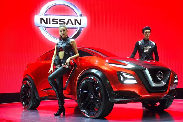 عارضات كوريات تقدّمن سيارة نيسان الجديدة Nissan Gripz  خلال معرض للسيارات Seoul Motor Show  في سيئول، كوريا الجنوبية 30 مارس/ آذار 2017 - سبوتنيك عربي