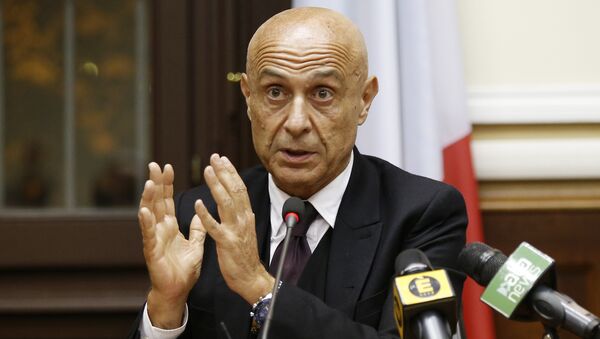 Italian Interior Minister Marco Minniti speaks during a press conference after a security meeting in Milan, Italy (File) - سبوتنيك عربي