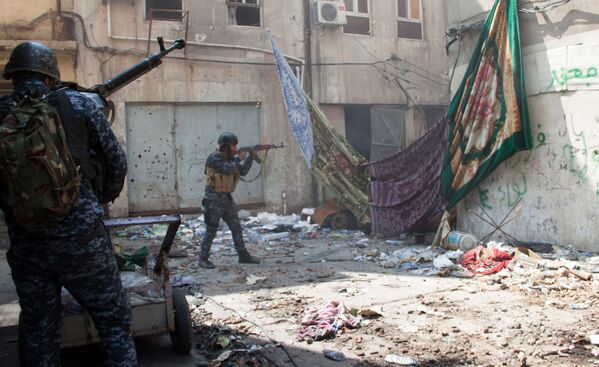 القوات العراقية خلال مهمة في مدينة الموصل، العراق - سبوتنيك عربي