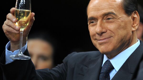 Silvio Berlusconi prima di una partita di calcio Serie A al San Siro Stadium a Milano. - سبوتنيك عربي