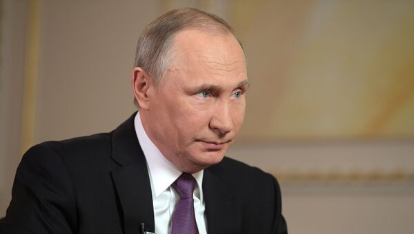 الرئيس بوتين خلال مقابلة مع قناة مير - سبوتنيك عربي