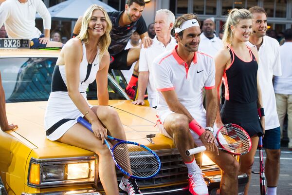 لاعبة التنس الروسية ماريا شارابوفا ولاعب التنس روجر فيدرير في نيويورك، 24 أغسطس/ آب 2015 - سبوتنيك عربي
