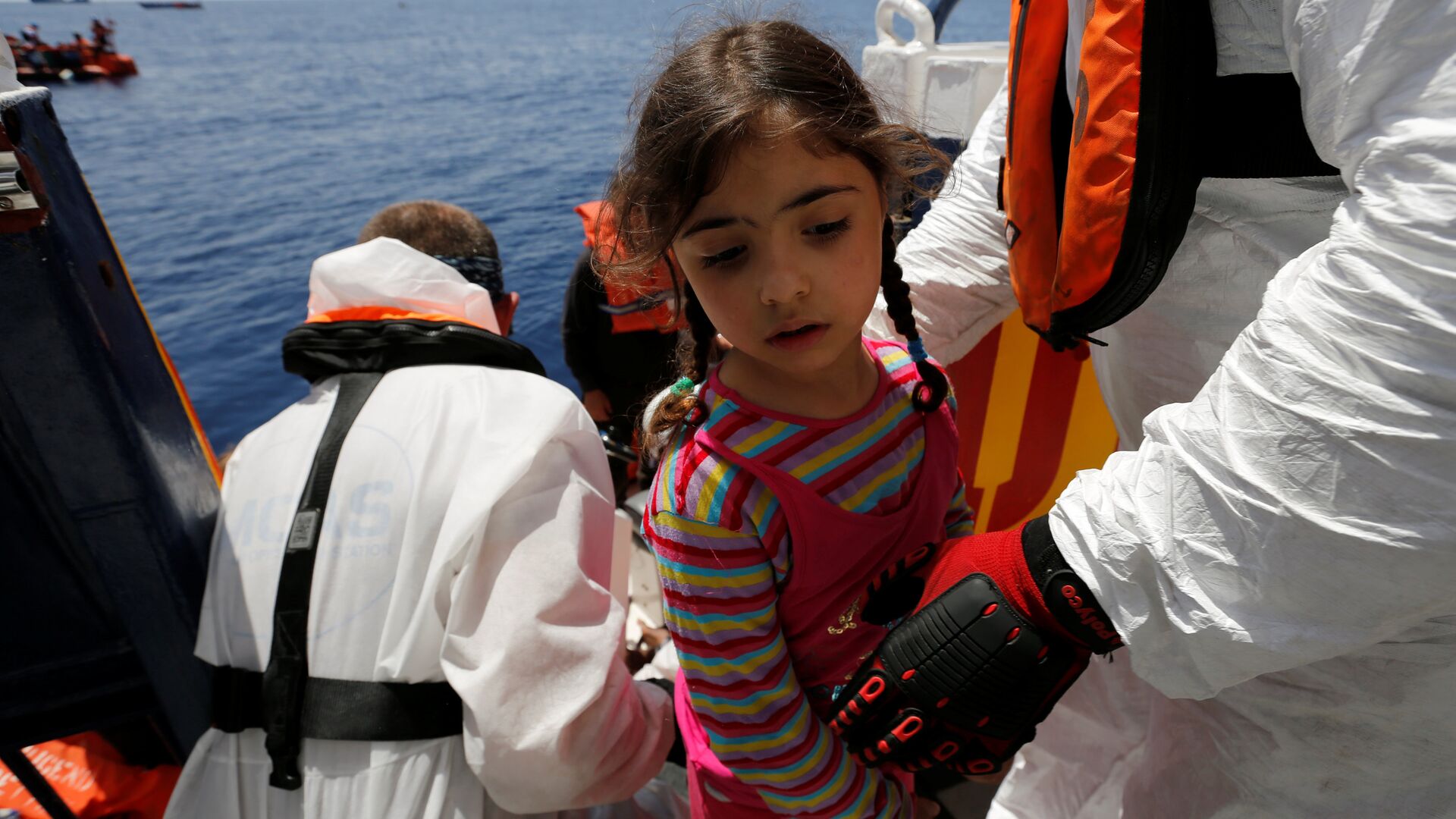 إغاثة طفلة من قارب هجرة قبالة مالطا - سبوتنيك عربي, 1920, 26.10.2021
