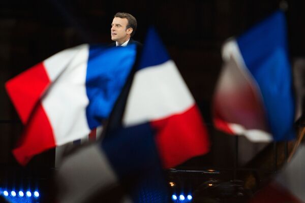 قائد حركة إلى الأمام إيمانويل ماكرون يفوز في الانتخابات الرئاسية الفرنسية - سبوتنيك عربي