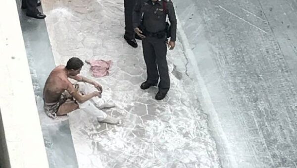 رجل يحرق نفسه في بانكوك - سبوتنيك عربي
