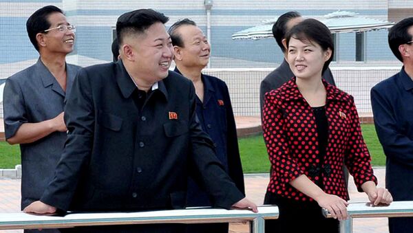 زوجة زعيم كوريا الشمالية كيم جون أون وزوجته - سبوتنيك عربي