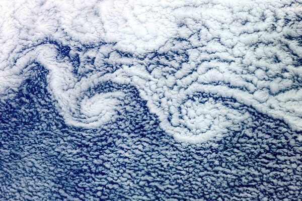 صورة لغيوم التقطها رائد فضاء الروسي فيودور يورتشيخين من على مركبة الفضاء الدولية - سبوتنيك عربي