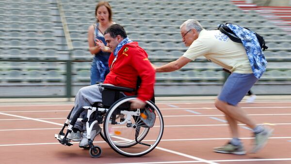 المشاركون في أولمبياد كبار السن (Olympics for Seniors) في ملعب كينغ بودوين (King Baudouin) في بروكسيل، بلجيكا - سبوتنيك عربي