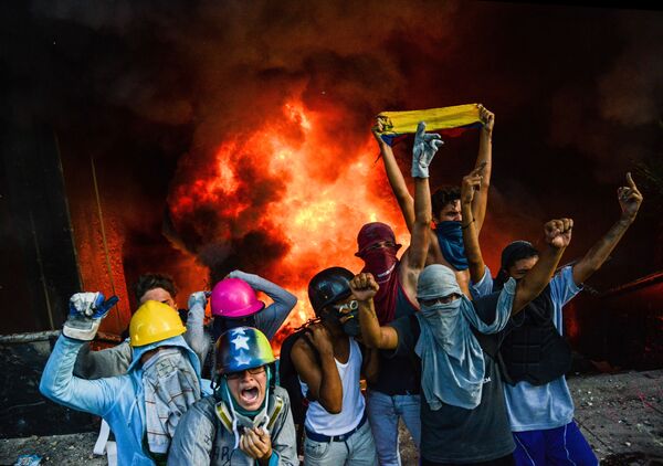 استمرار احتجاجات كاراكاس المناهضة للرئيس، فنزويلا 12 يونيو/ حزيران 2017 - سبوتنيك عربي